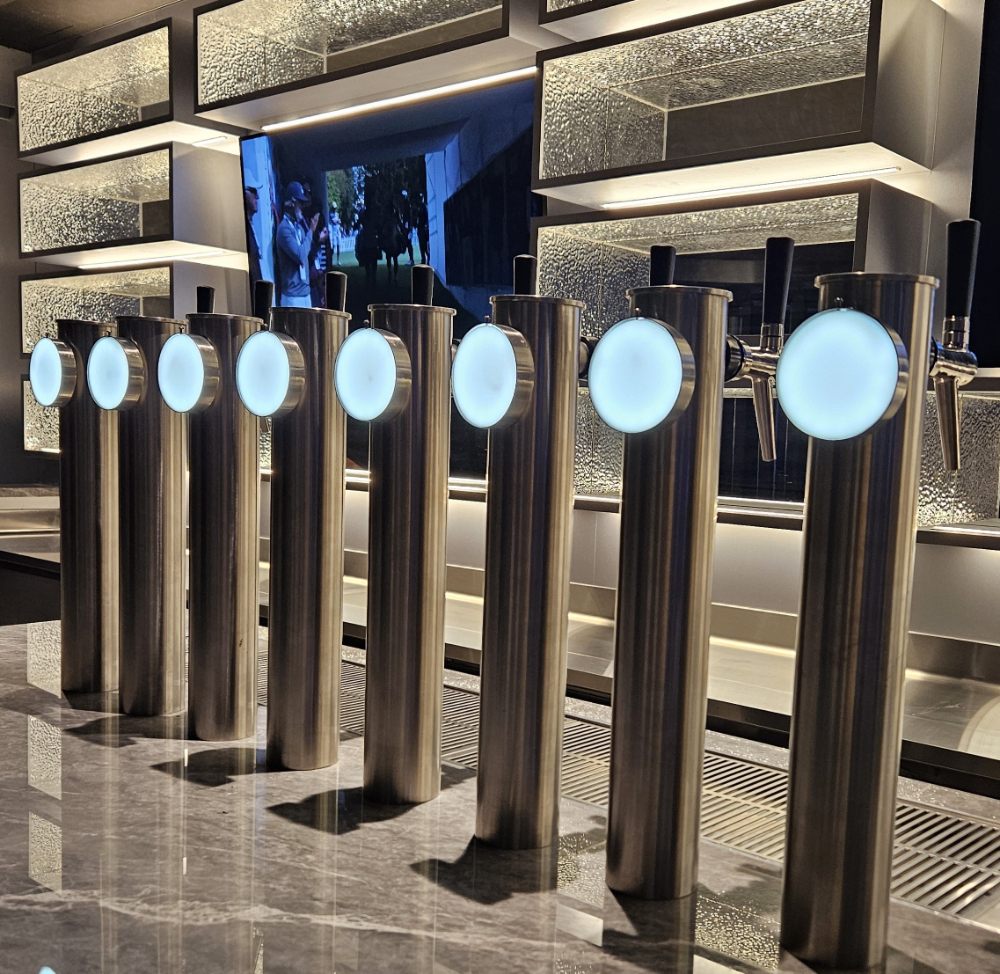 8 single beer taps matching interior design