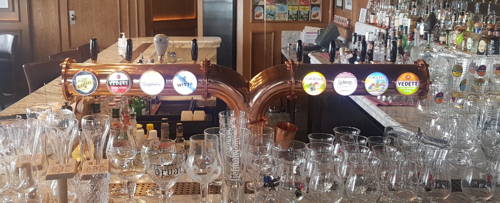 Extra cold draught beer on copper tower