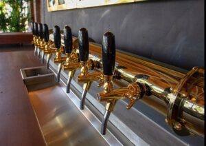 Gold coated wall mounted beer bridge