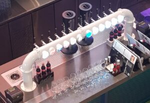 White coated beer bridge with 12 taps